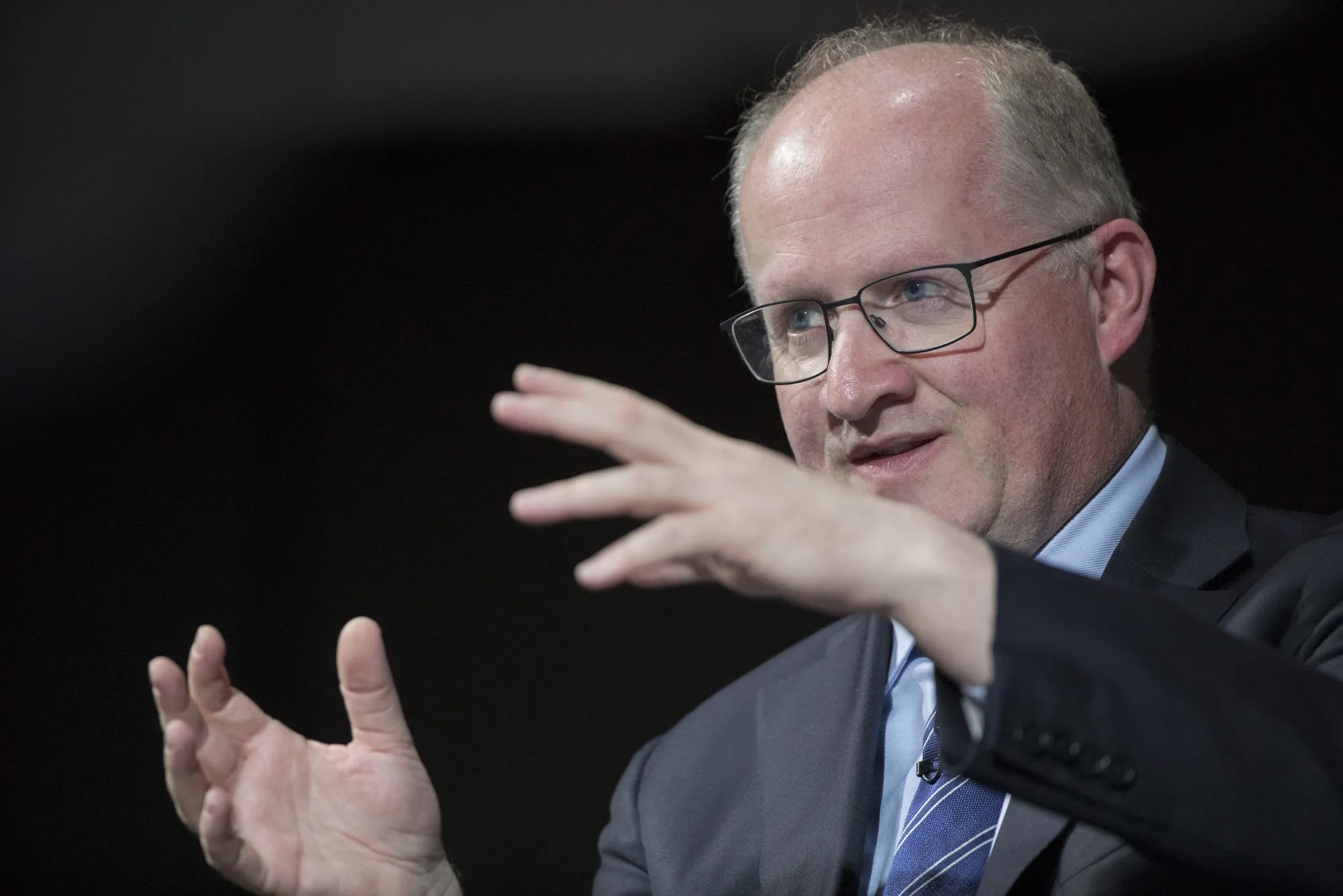 Philip Lane, chief economist of the European Central Bank (ECB), gestures as he answers questions after delivering a speech on monetary policy at Bloomberg's European headquarters in London, U.K., on Monday, Sept. 16, 2019. The ECB has the scope to buy bonds as part of its monetary stimulus for quite a while before hitting self-imposed limits, according Lane.