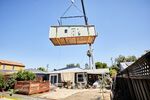 Backyard apartments by Abodu arrive by delivery to be assembled on site in San Jose.