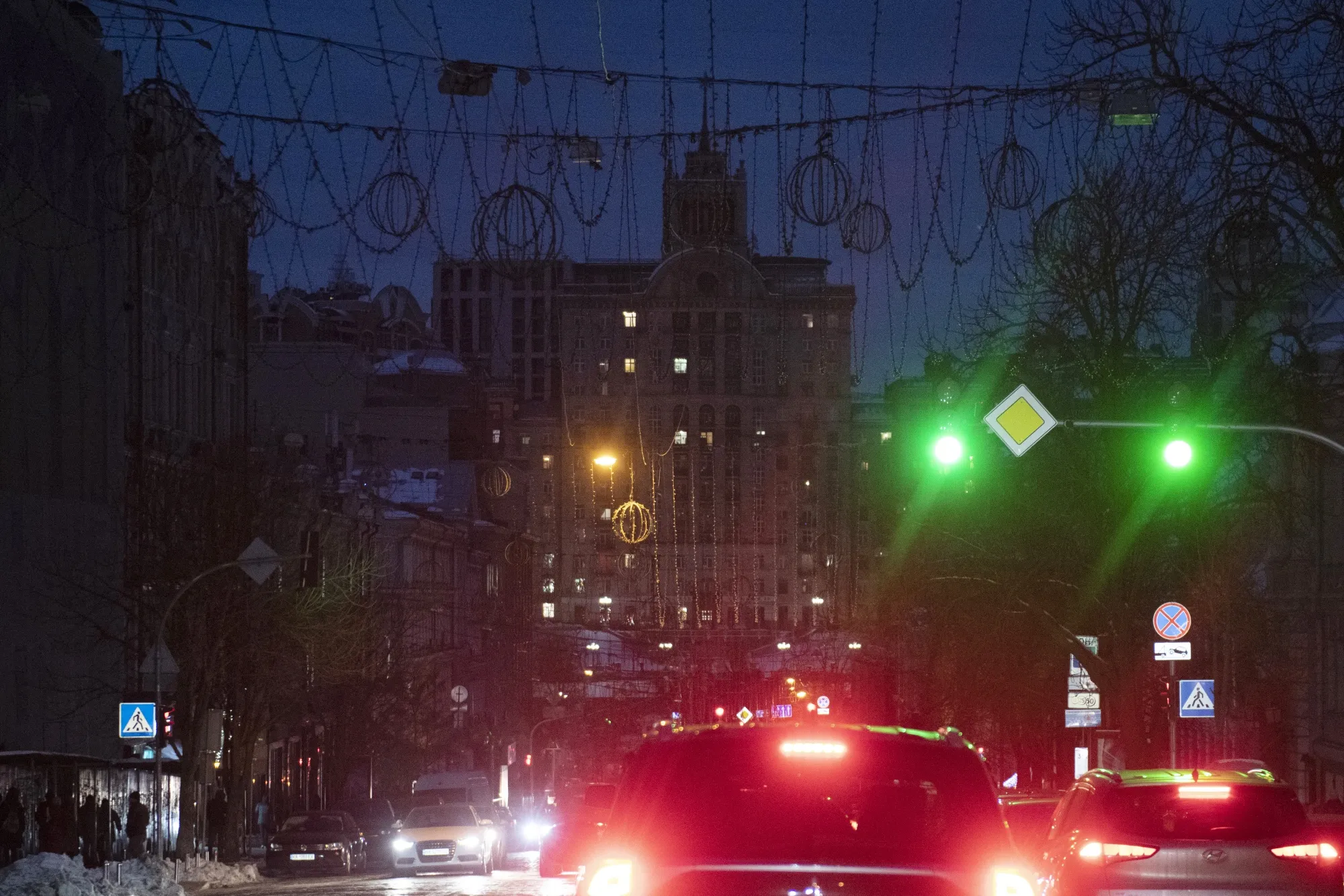 Motorists wait in traffic during a power outage in Kyiv.