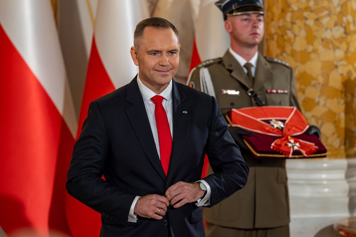 Rating Warning Puts Polish Partisan Split in Focus for Investors