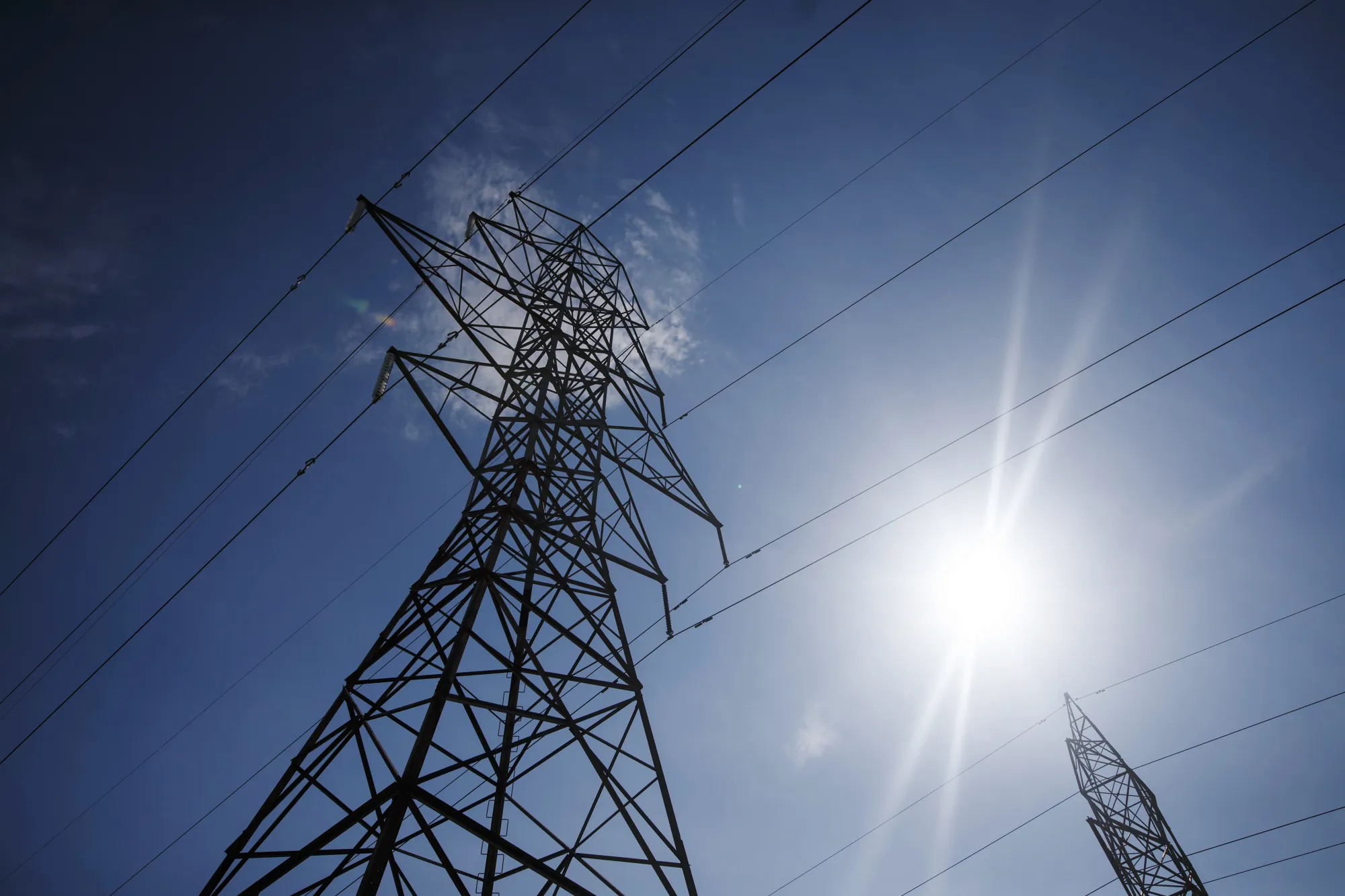 Power lines run through Hydro One Ltd. transmission towers in Toronto, Ontario.