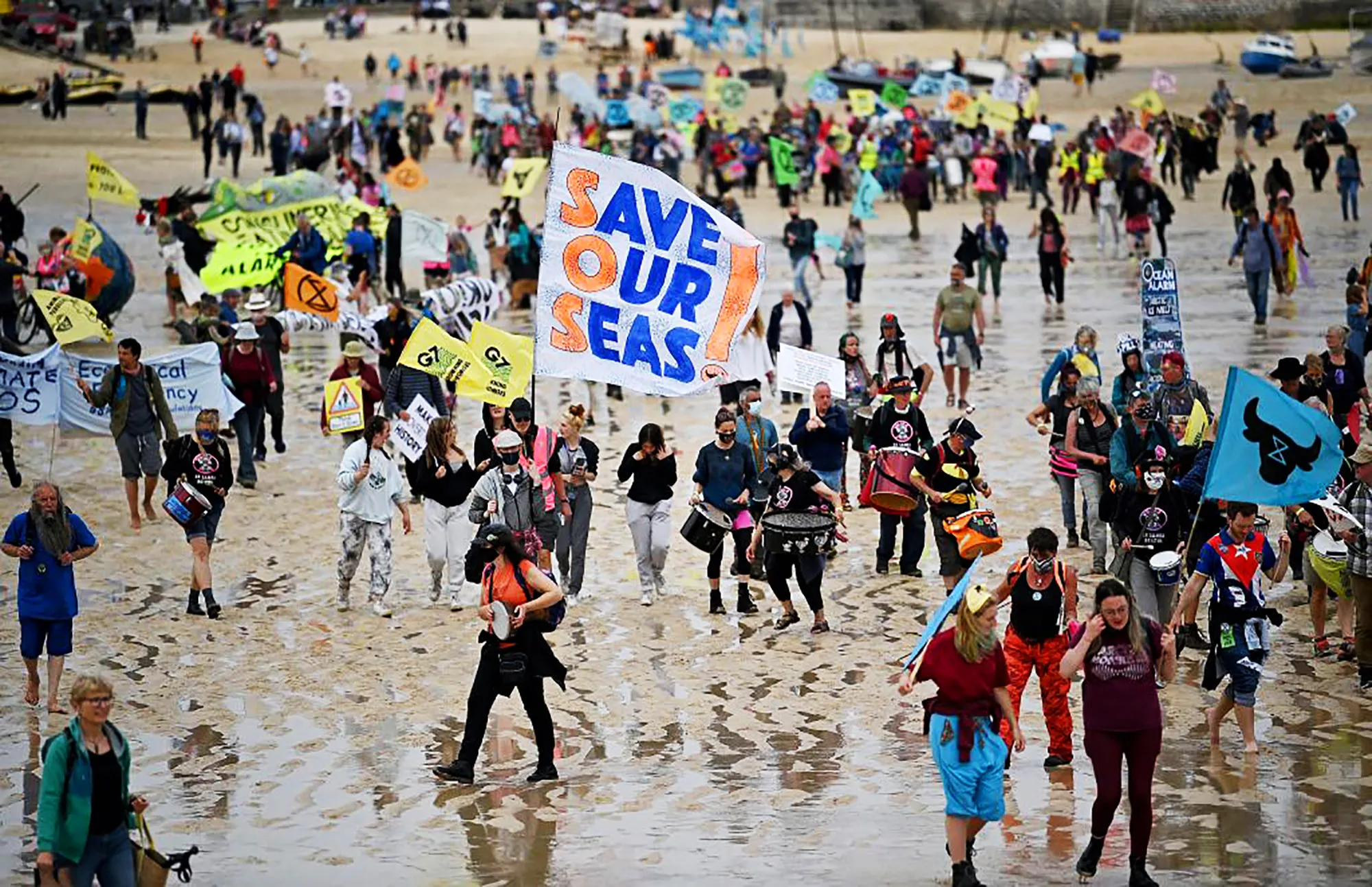 Demonstrators gather for a climate change protest in Cornwall on June 11.