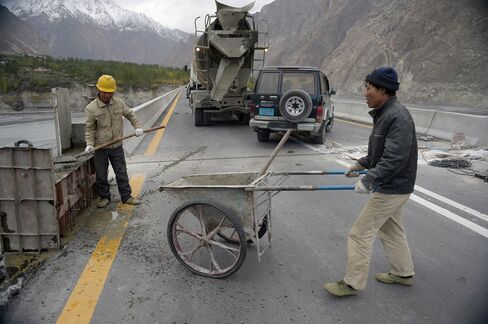 Chinese labourers work on the Karakoram highway in Gulmit village of Hunza valley in northern Pakistan.