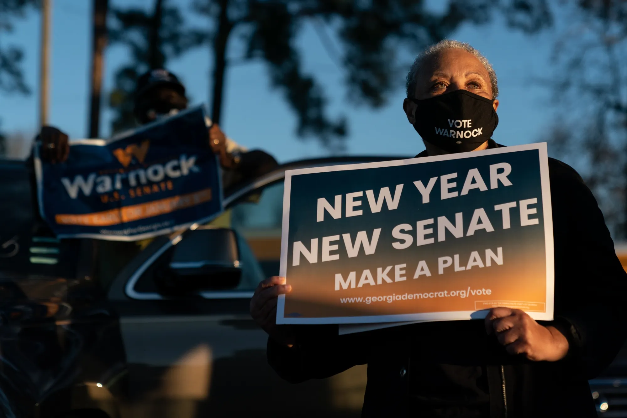 An attendee during a 'Get Out The Vote' campaign event with Raphael Warnock and Jon Ossoff in Garden City, Georgia.
