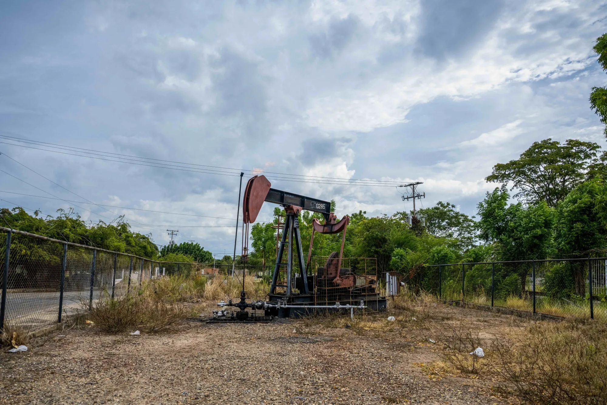 A pump jack in the Campo Elias neighborhood in Cabimas, south of Lake Maracaibo, Zulia State, Venezuela.