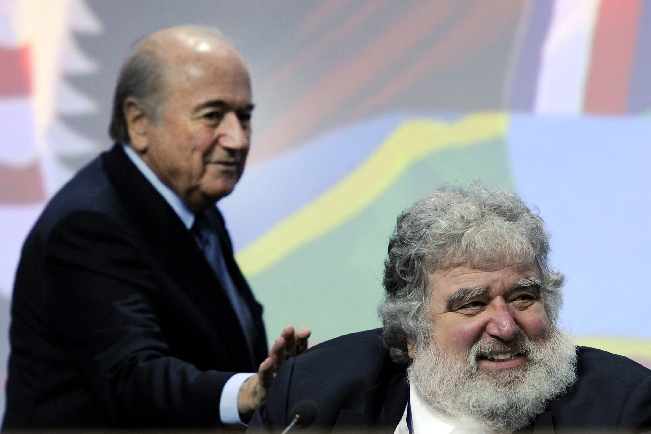 Sepp Blatter (L) taps shoulders of Chuck Blazer, on June 1, 2011 at the start of the 61st FIFA congress in Oerlikon near Zurich.
