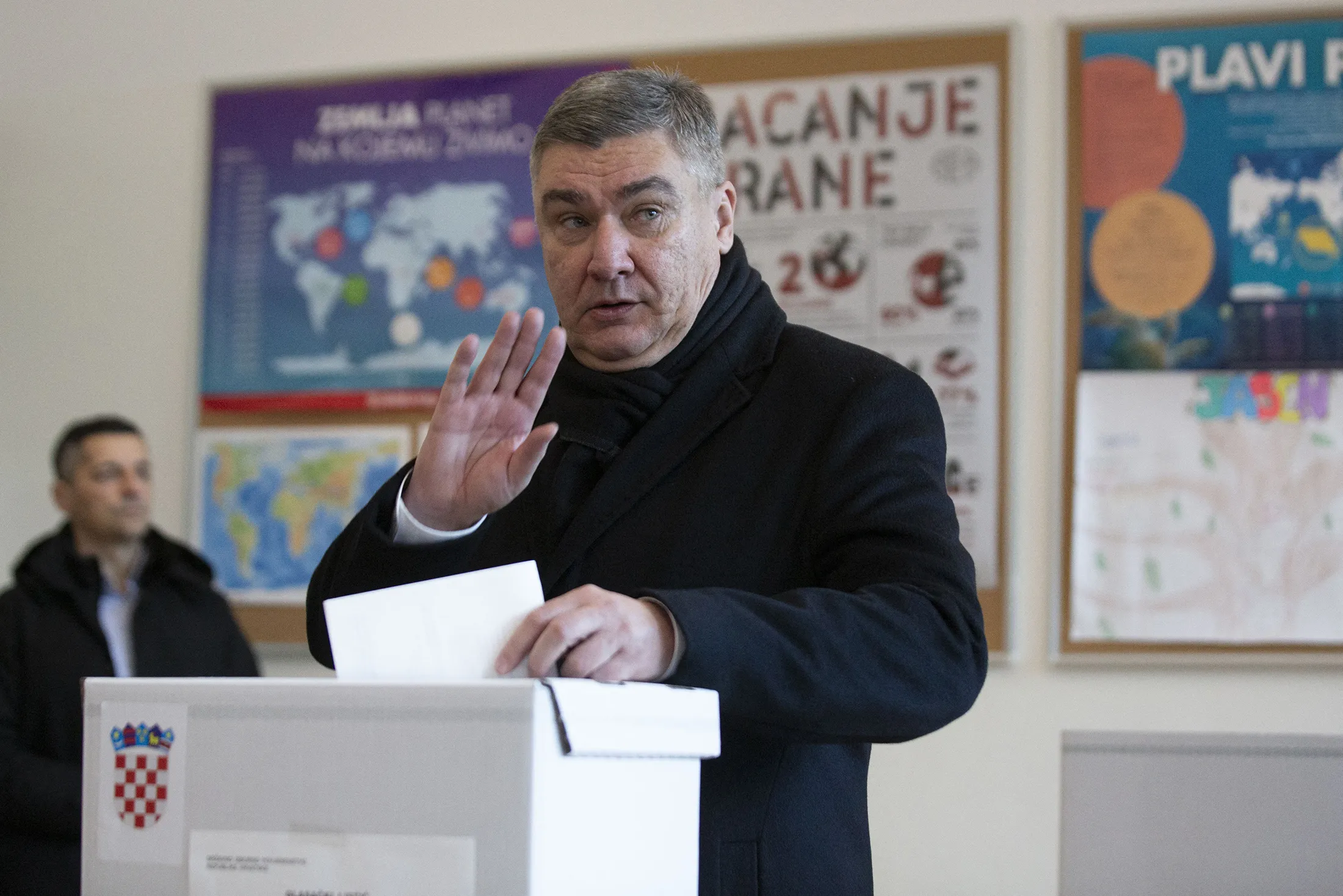 Zoran Milanovic casts a ballot at a polling station during the presidential elections in Zagreb on Dec. 29.