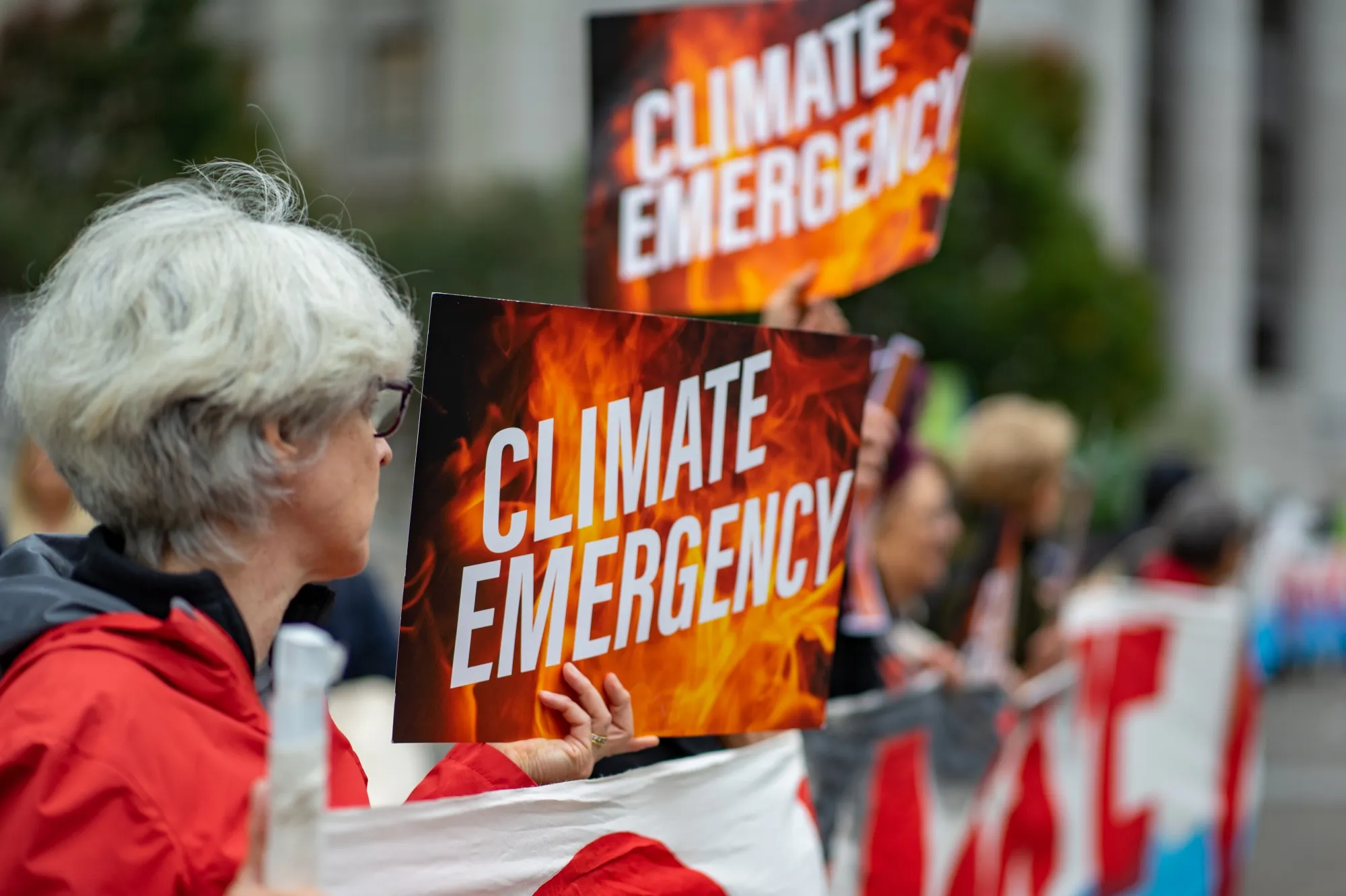 Demonstrators protest on the first day of the ExxonMobil Corp. trial outside the New York State Supreme Court building in lower Manhattan.