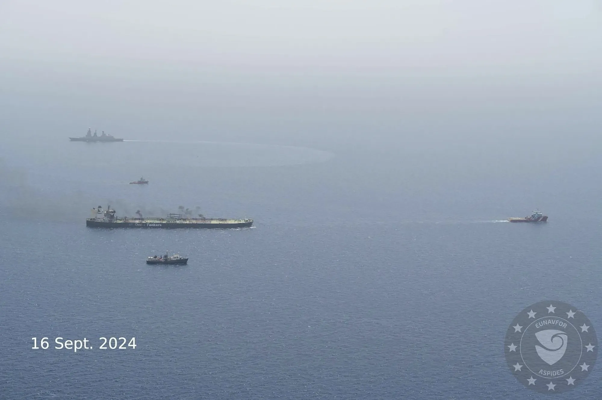 In this photo released by EUNAVFOR ASPIDES, the&nbsp;oil tanker MV-Sounion, left, is towed to safety on Sept. 16.&nbsp;