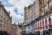 Victoria Street with its medieval houses and shops with brightly colored facades, Edinburgh, Scotland.