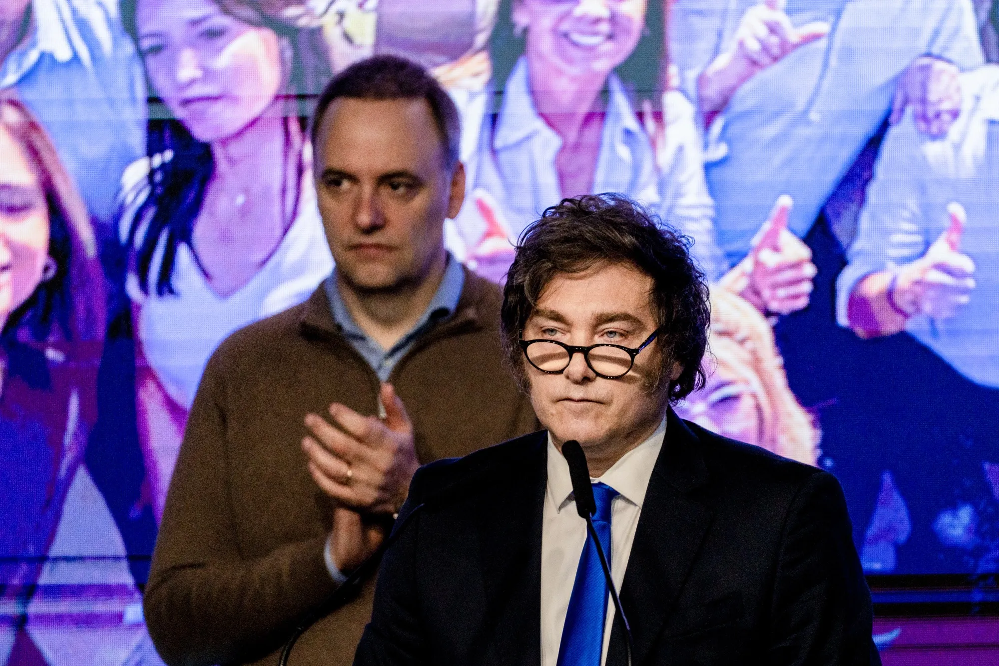 Manuel Adorni and Javier Milei at an election night rally in Buenos Aires on Oct. 26.