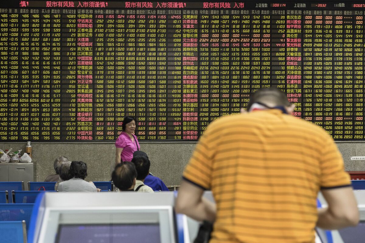 Chinese Stocks Struggle to Hold On to Rally as Tariffs Begin Bloomberg