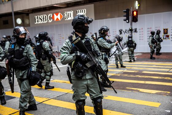 Protesters Block Roads After Police Halt Rally: Hong Kong Update