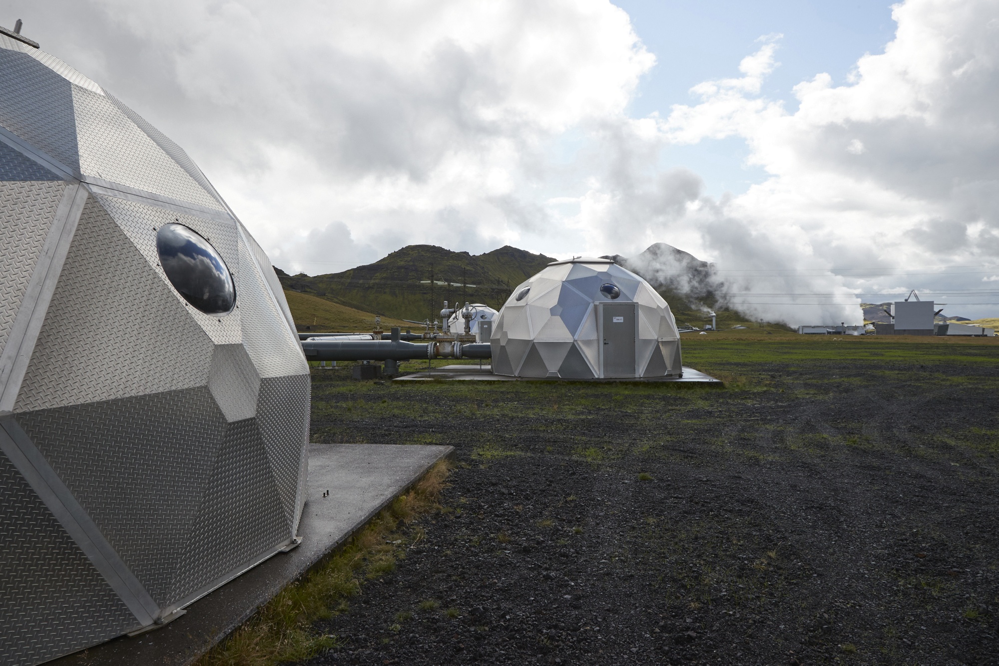 Pods, operated by Carbfix, containing technology for storing carbon dioxide underground, in Hellisheidi, Iceland.