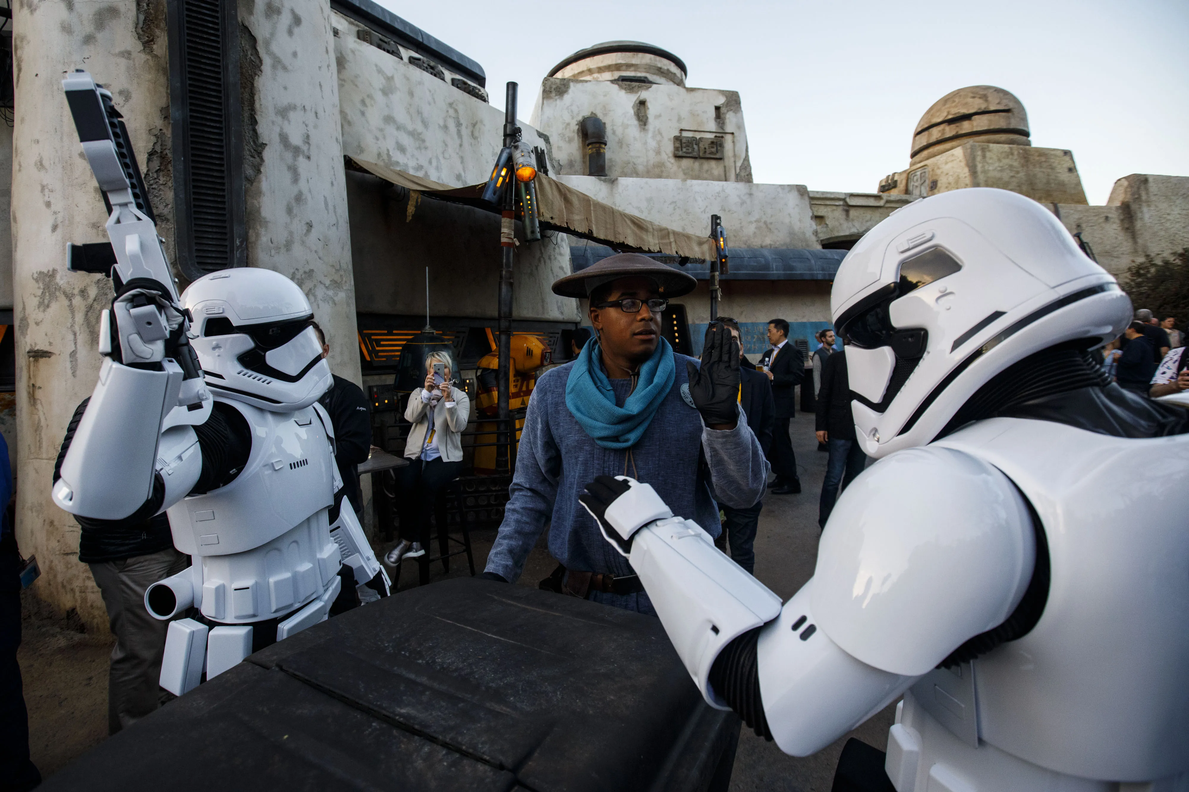 Stormtroopers interact with a cast member during the unveiling of Star Wars: Galaxy's Edge at Walt Disney Co.'s Disneyland theme park in Anaheim, California, U.S., on Wednesday, May 29, 2019.&nbsp;