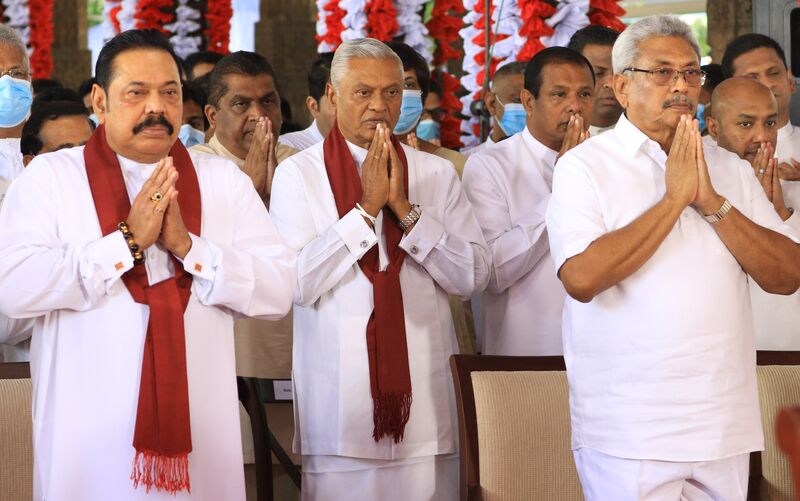 Mahinda, Chamal and Gotabaya Rajapaksa during a Cabinet swearing-in in August 2020.