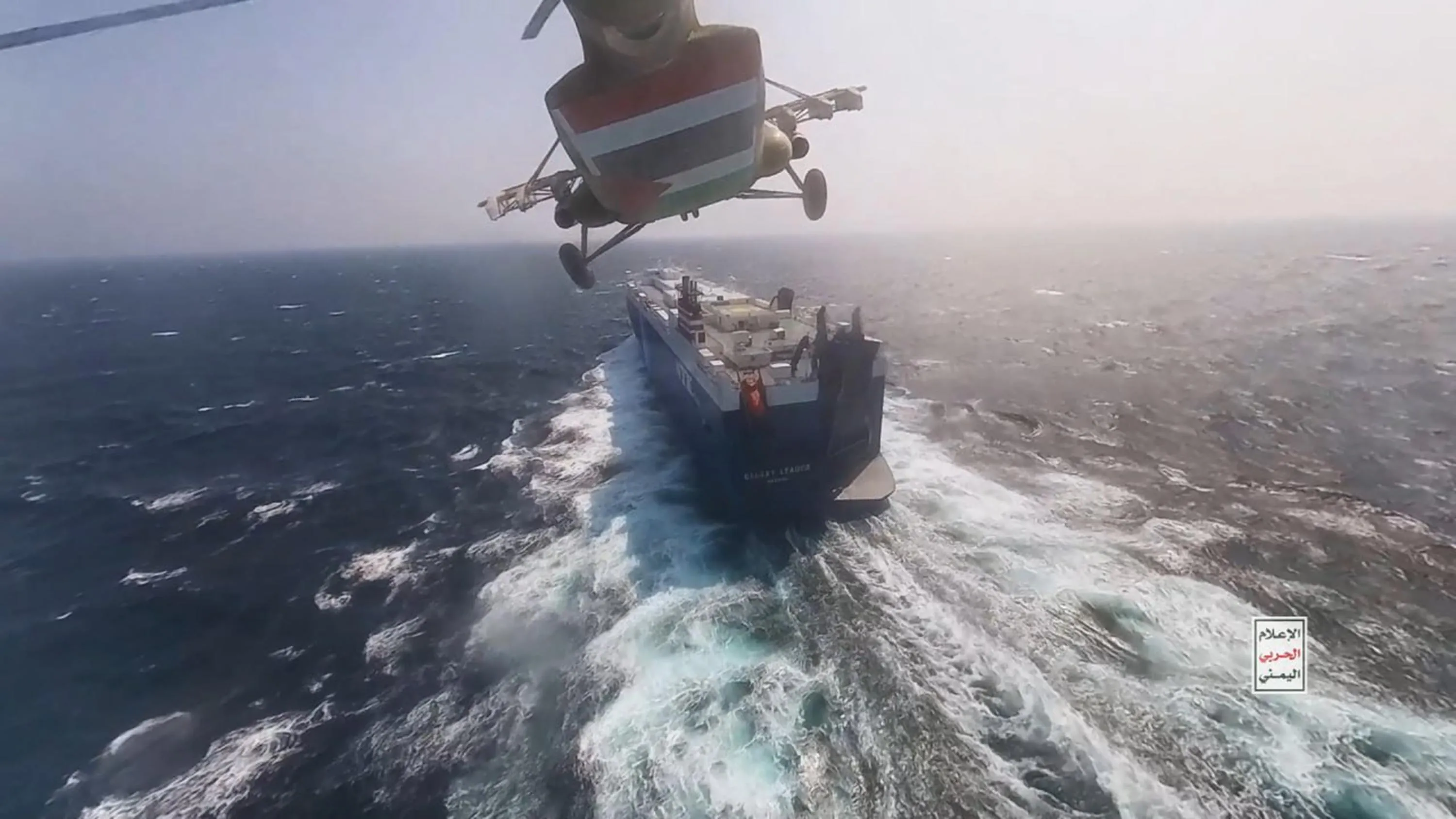 Houthi fighters approach the Galaxy Leader in the Red Sea on Nov. 20.