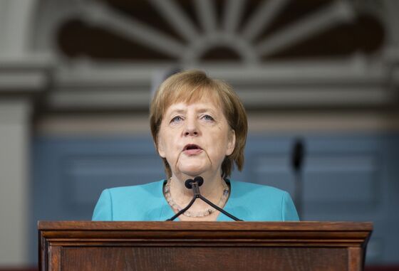 Merkel Has Harvard Cheering Attack on Trump Politics of Lies