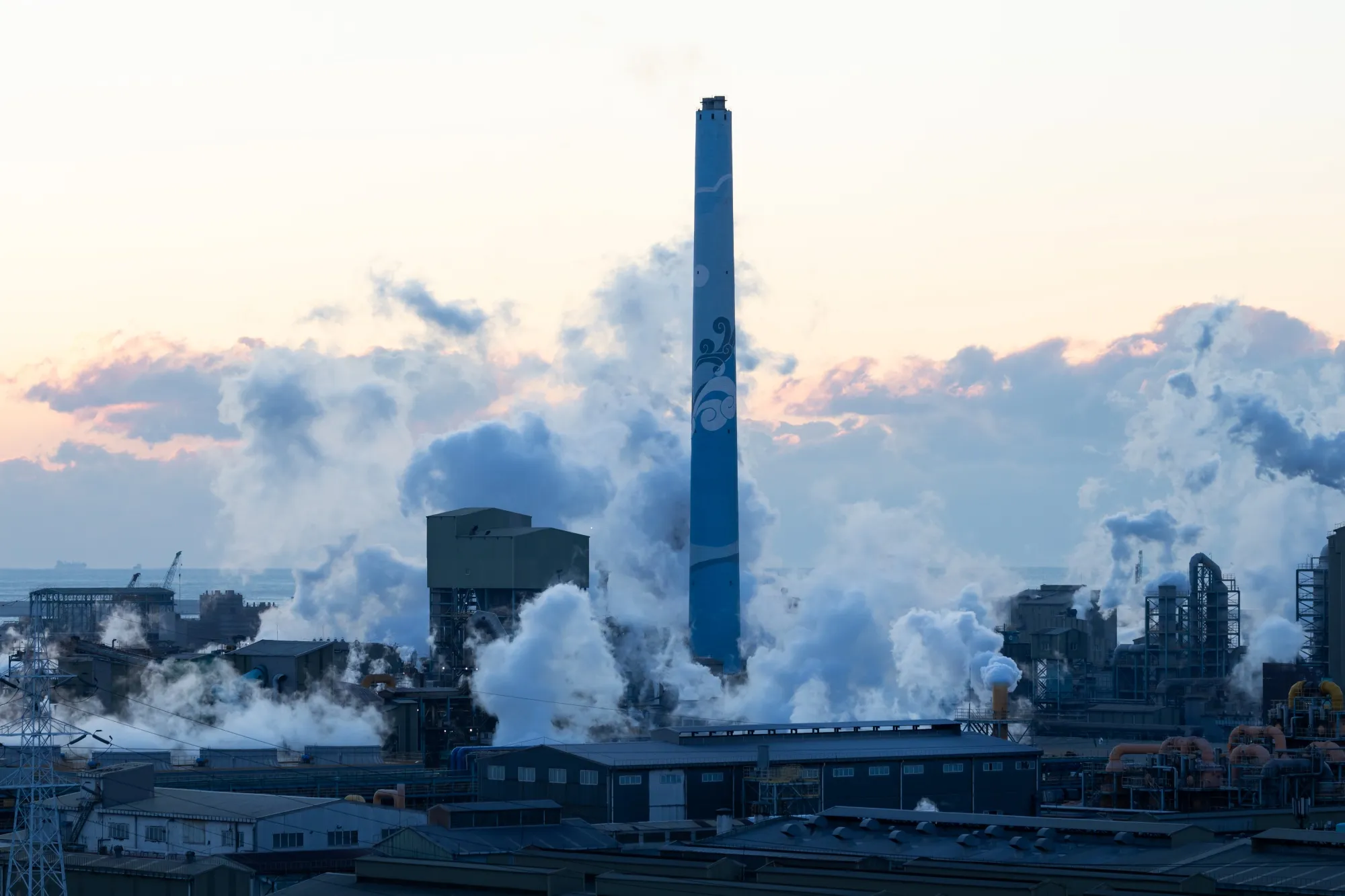 Water vapor and smoke rise from a Korea Zinc Co. smelting factory in Ulsan, South Korea.
