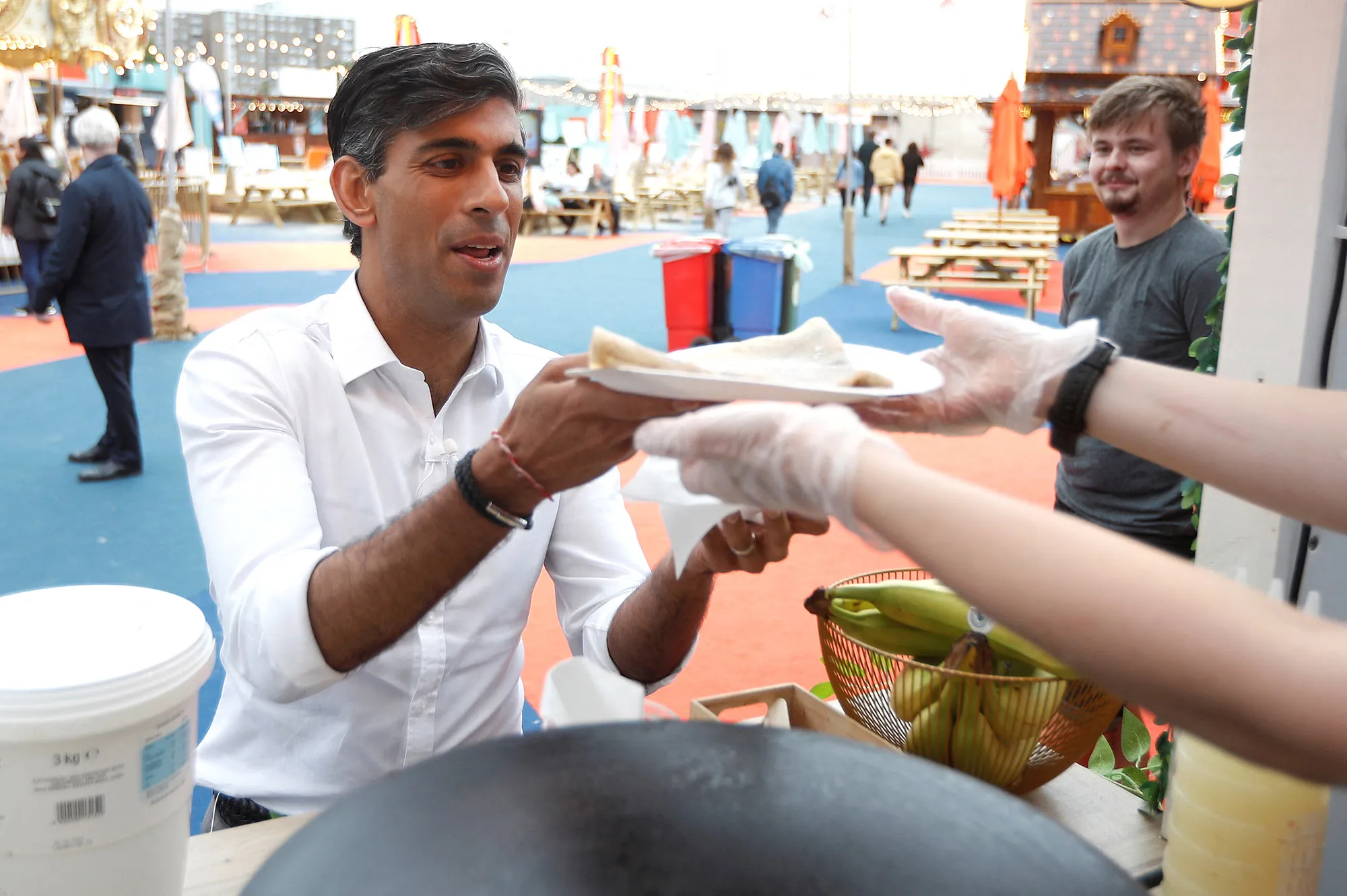 Rishi Sunak speaks with previously furloughed staff at the London Wonderground comedy and music festival venue,&nbsp;in London, on Aug,&nbsp;5.