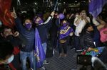 Supporters for left-wing parties celebrate in Santiago on May 16.