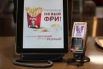 A tablet device displays the food menu inside a KFC fast food restaurant&nbsp;in Moscow, Russia.