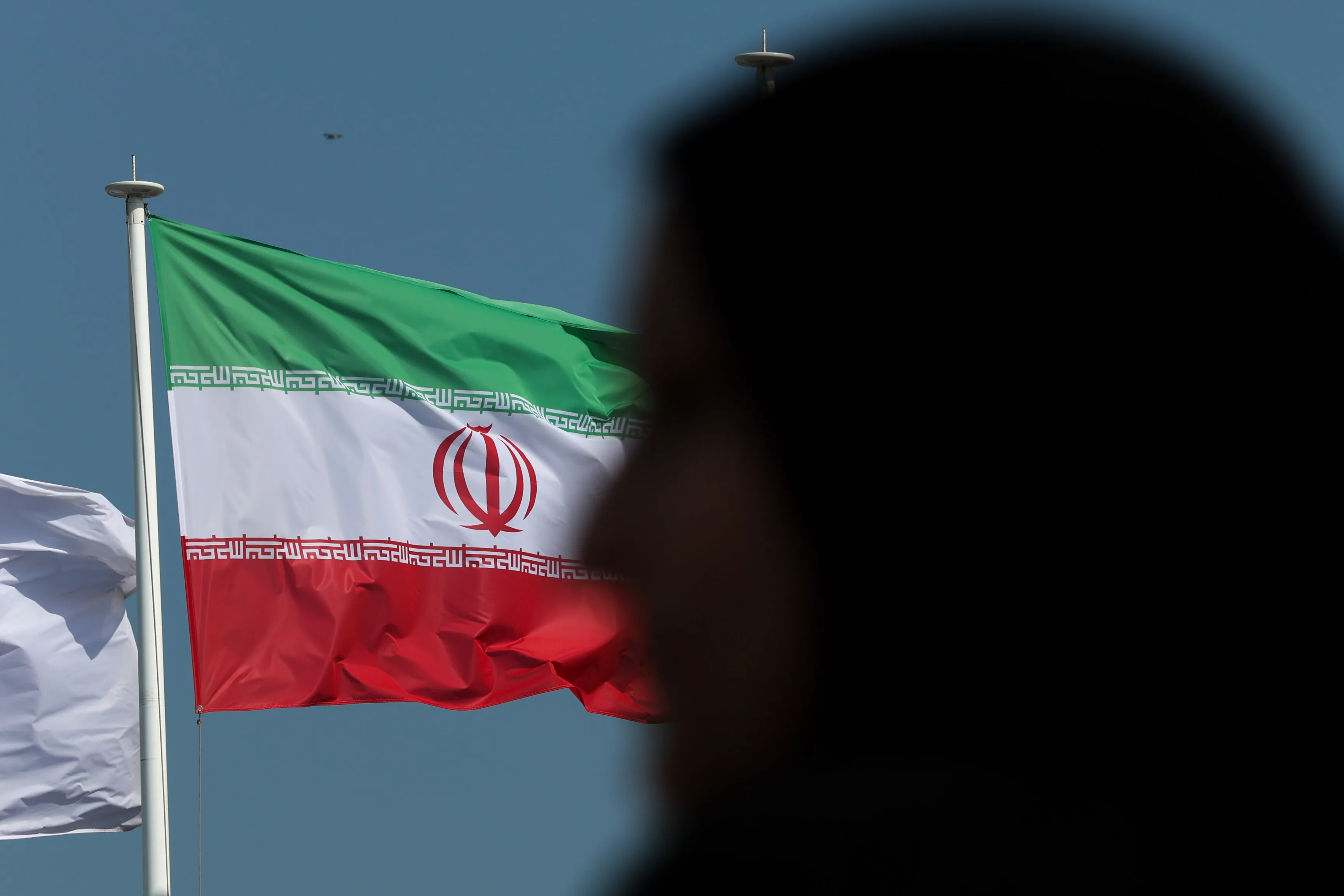 An Iranian national flag along the Doha Corniche in Doha.