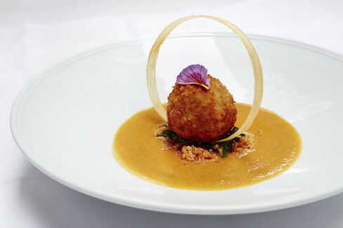 A tofu kofta, or meatball, is delicious with curried bottle gourd.