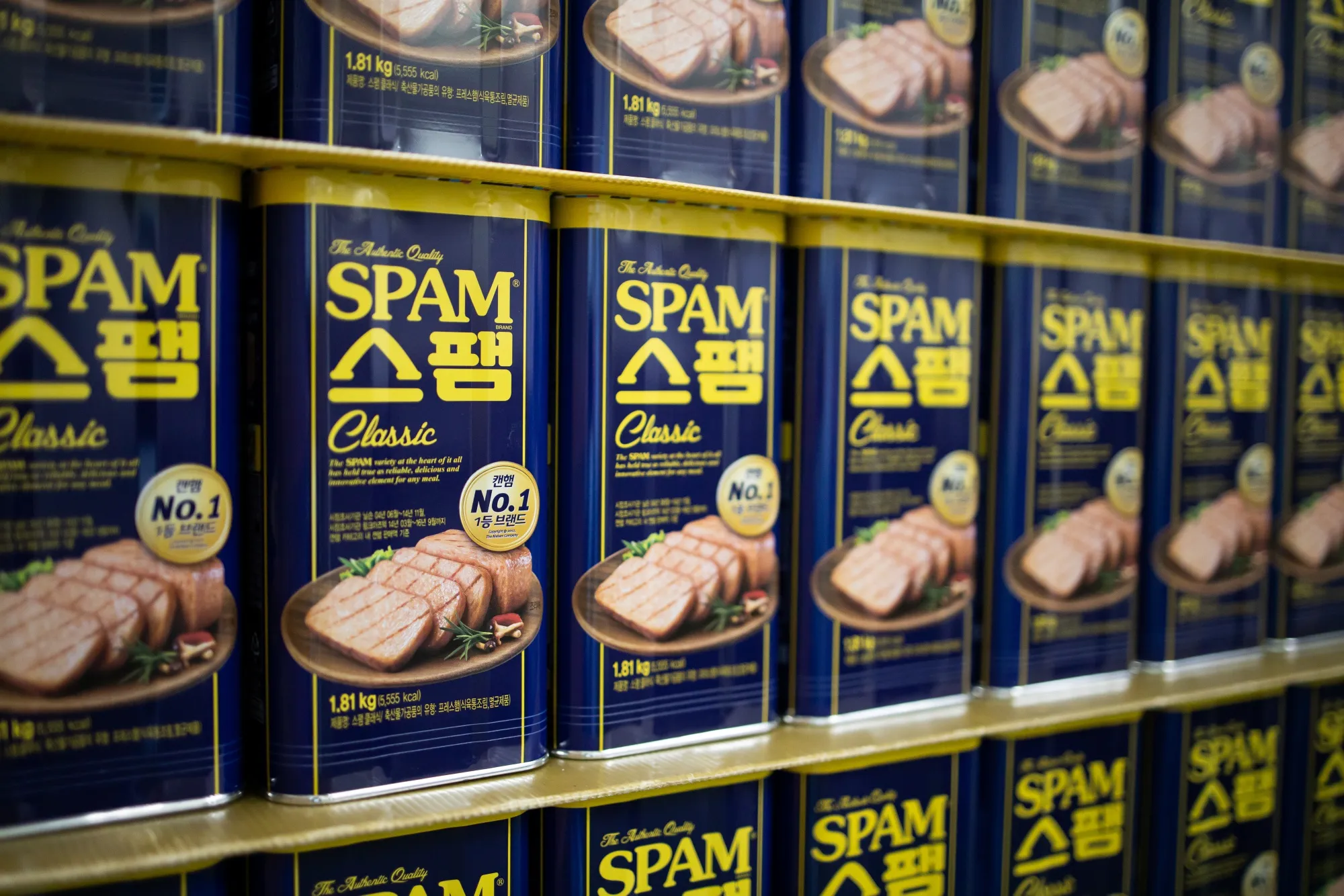 Cans of CJ CheilJedang Spam ham sit on the production line at the company’s factory in Jincheon, South Korea.