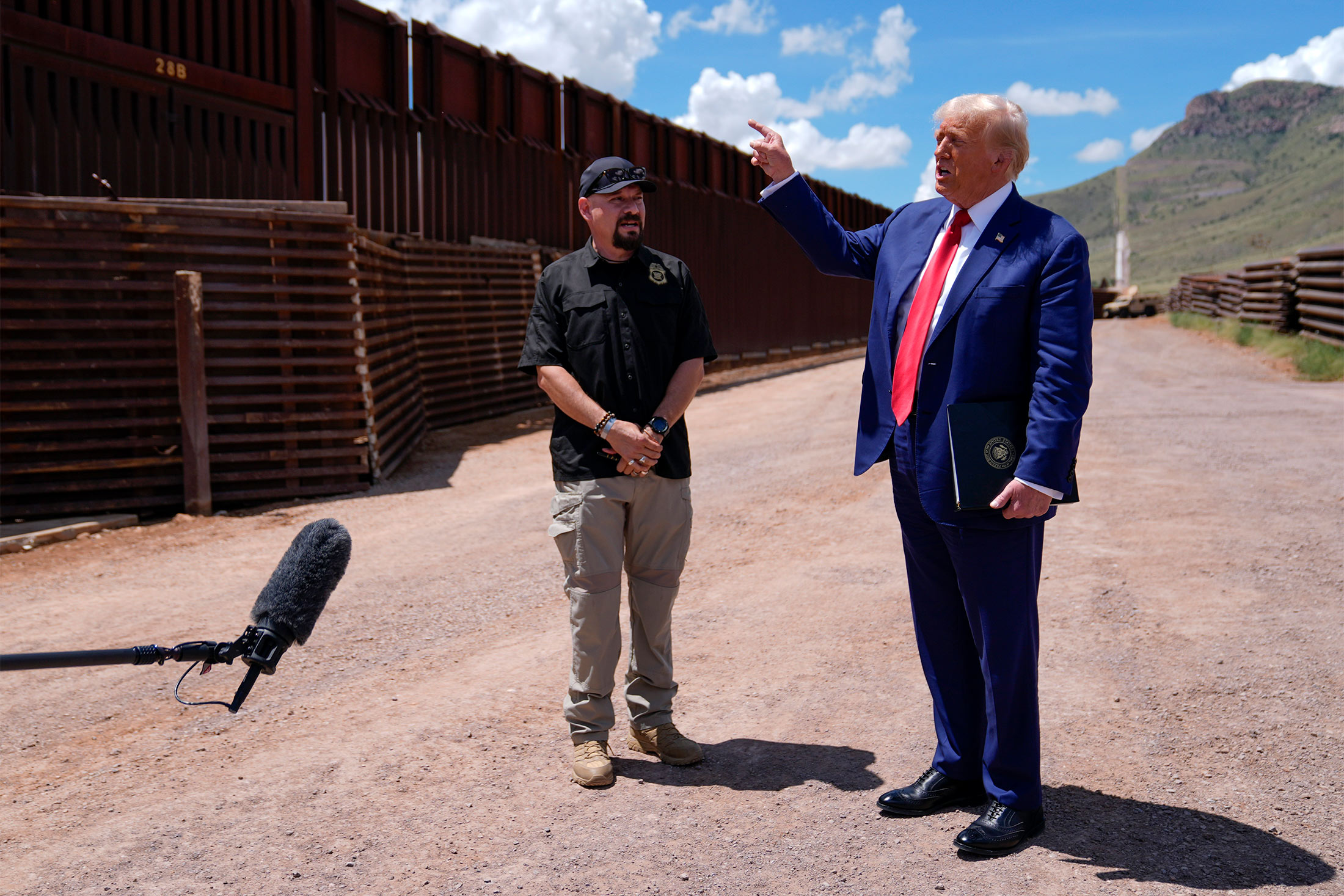 Donald Trump, right, and Paul Perez, president of the National Border Patrol Council, as Trump tours the southern border with Mexico, in Sierra Vista, Arizona, on Aug. 22.