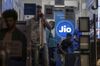 The logo of Reliance Jio, the mobile network of Reliance Industries Ltd., is displayed inside a store.