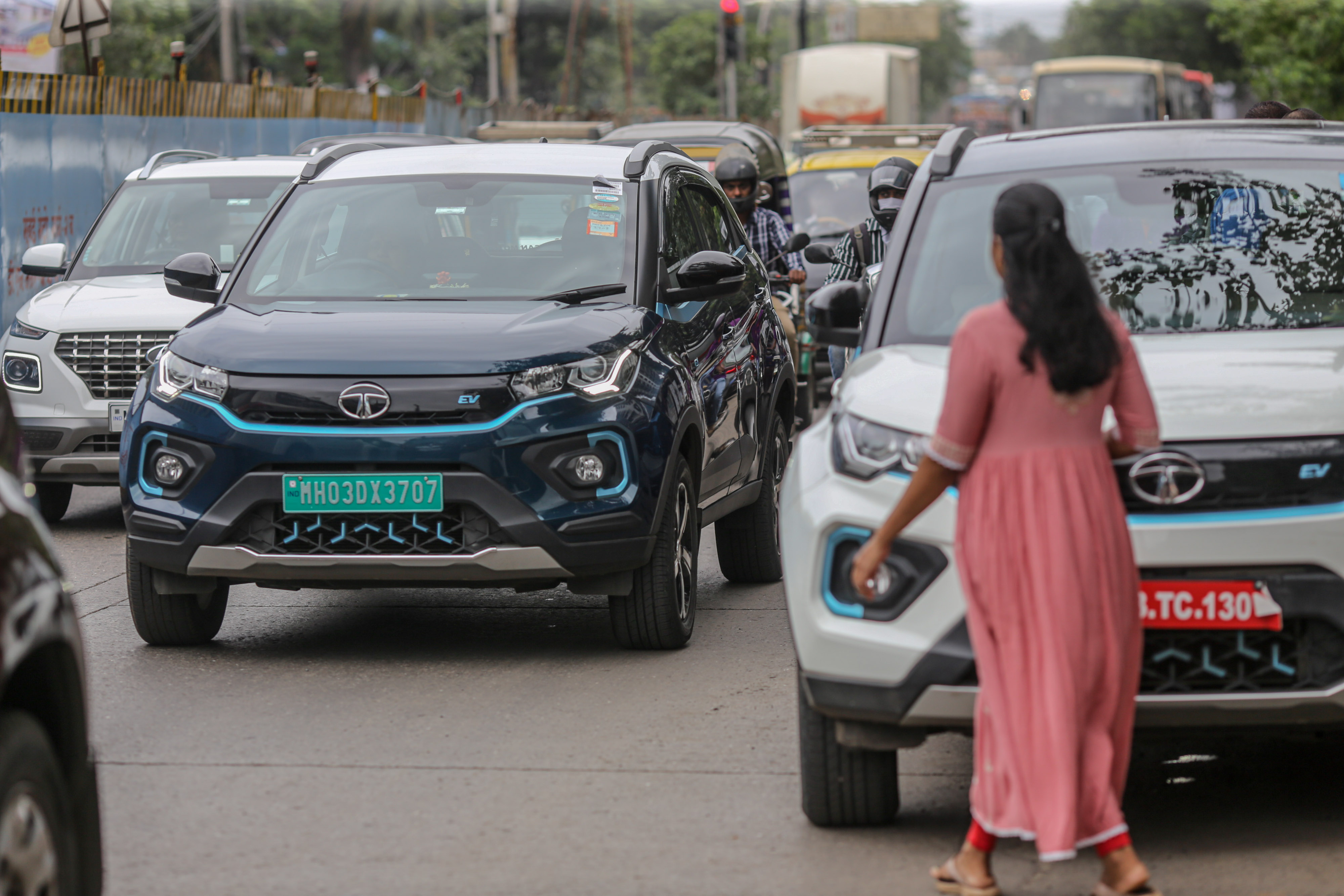 A Tata Motors Nexon EV, center, on a road in Mumbai.