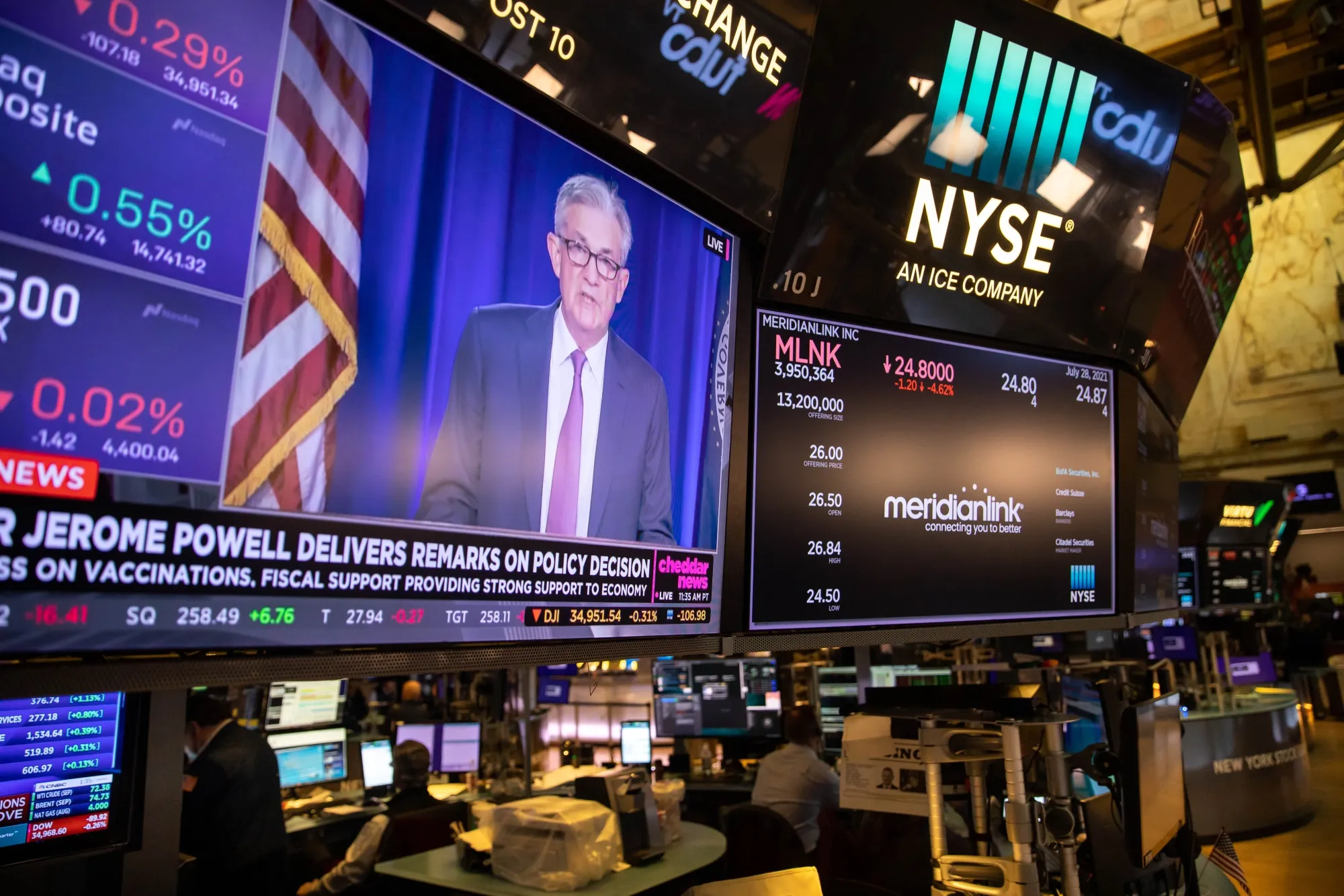 Traders On Floor Of The NYSE As Stocks Mixed Amid Earnings