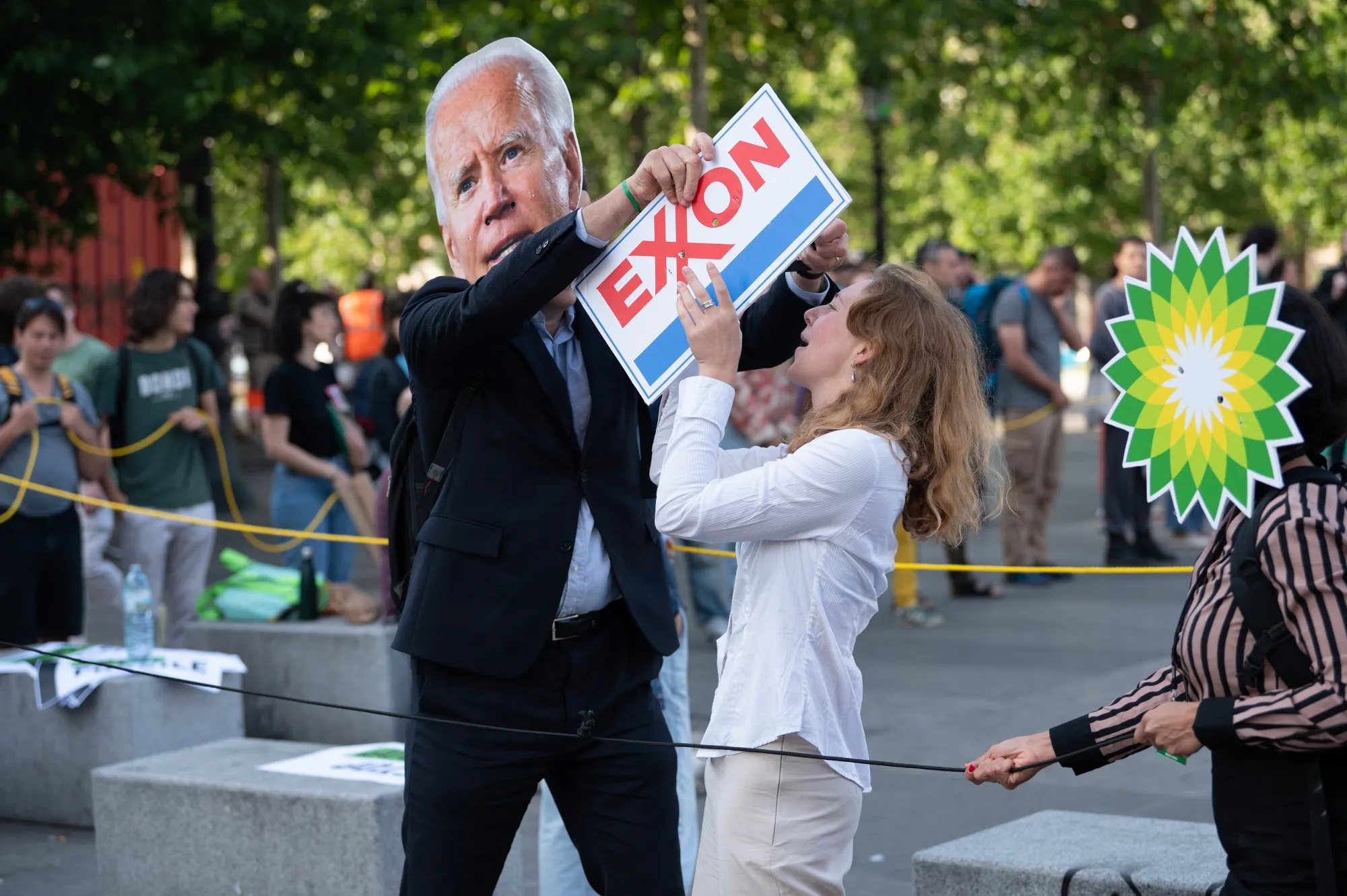 Climate activists stage a protest against fossil fuels and oil companies on the sidelines of the Global Climate Summit in Paris&nbsp;in June.&nbsp;
