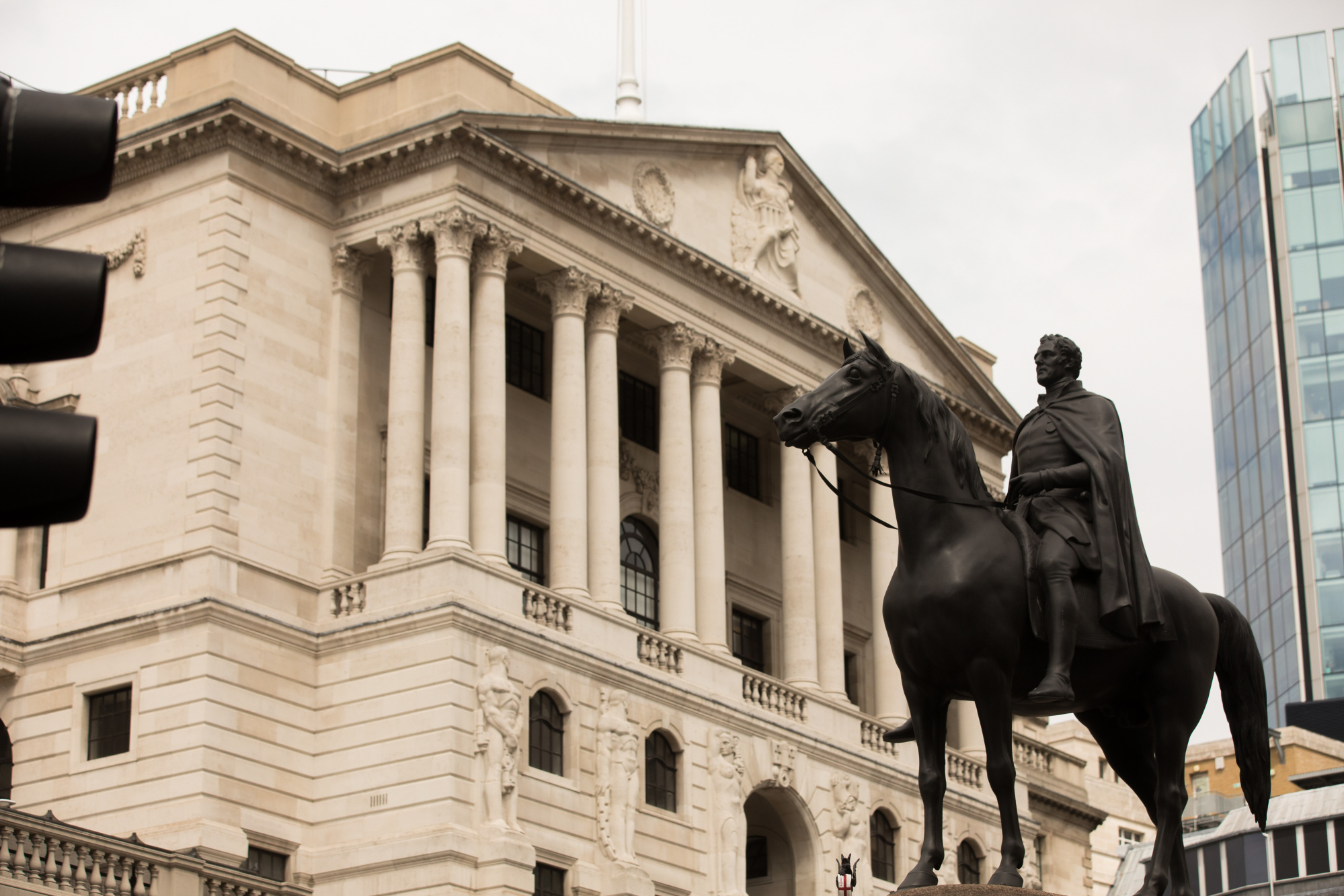 A statue of the Duke of Wellington on horseback stands in front of the Bank of England (BOE) in the City of London, U.K.