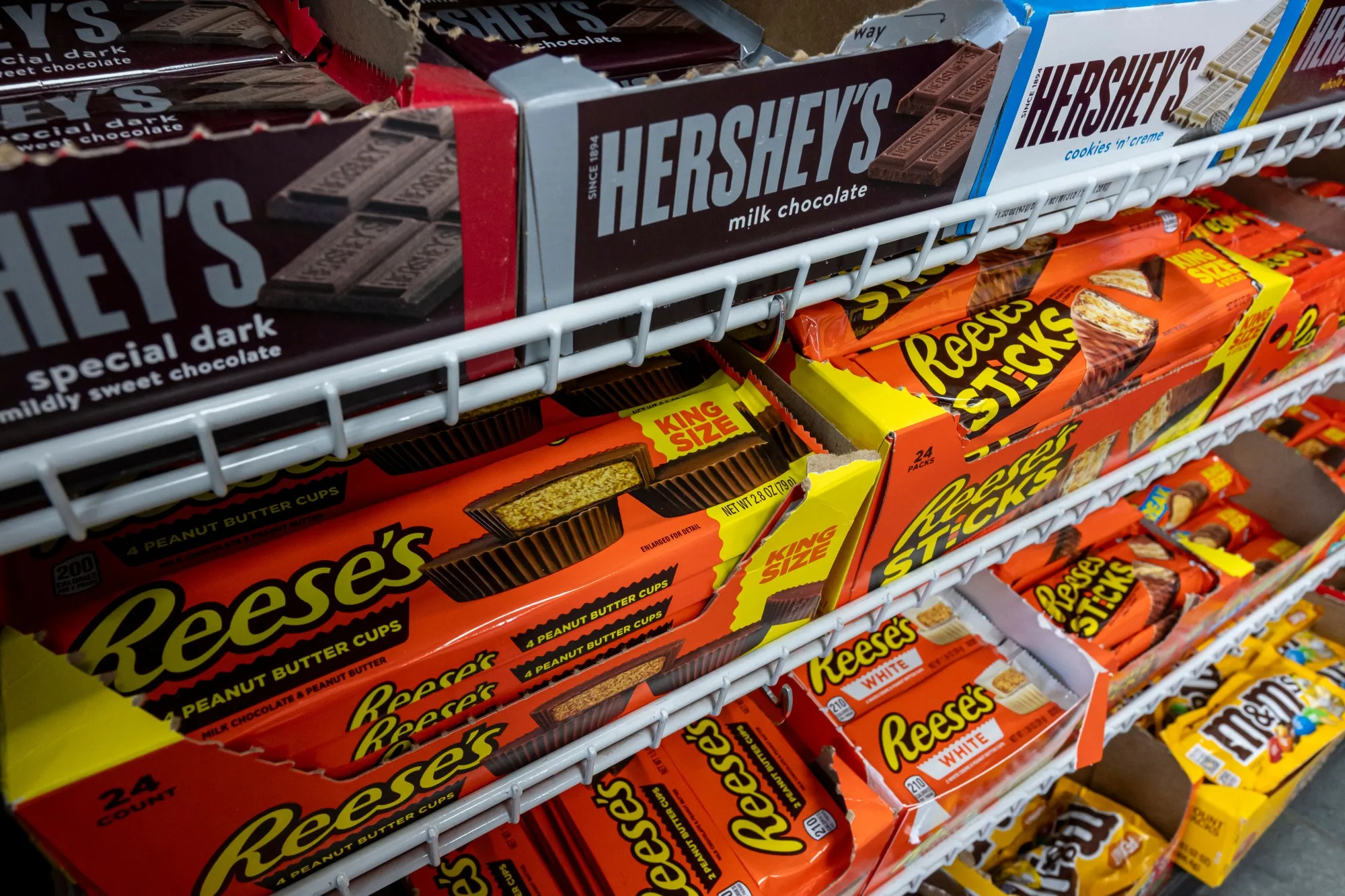 Hershey's chocolate bars and Hershey Co. Reese's brand peanut butter cups at a store in Crockett, California.