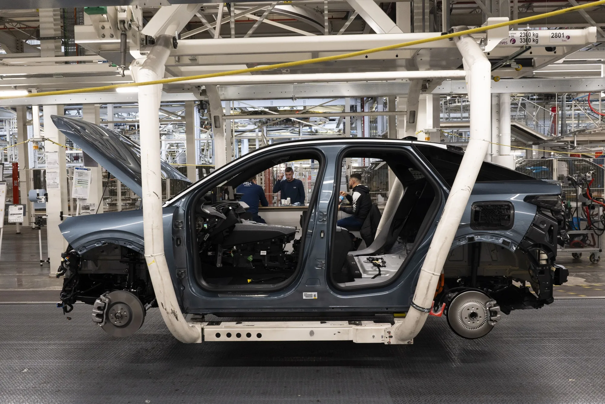 A Peugeot 3008 vehicle body on the assembly line at the Stellantis NV auto plant in Sochaux, France.