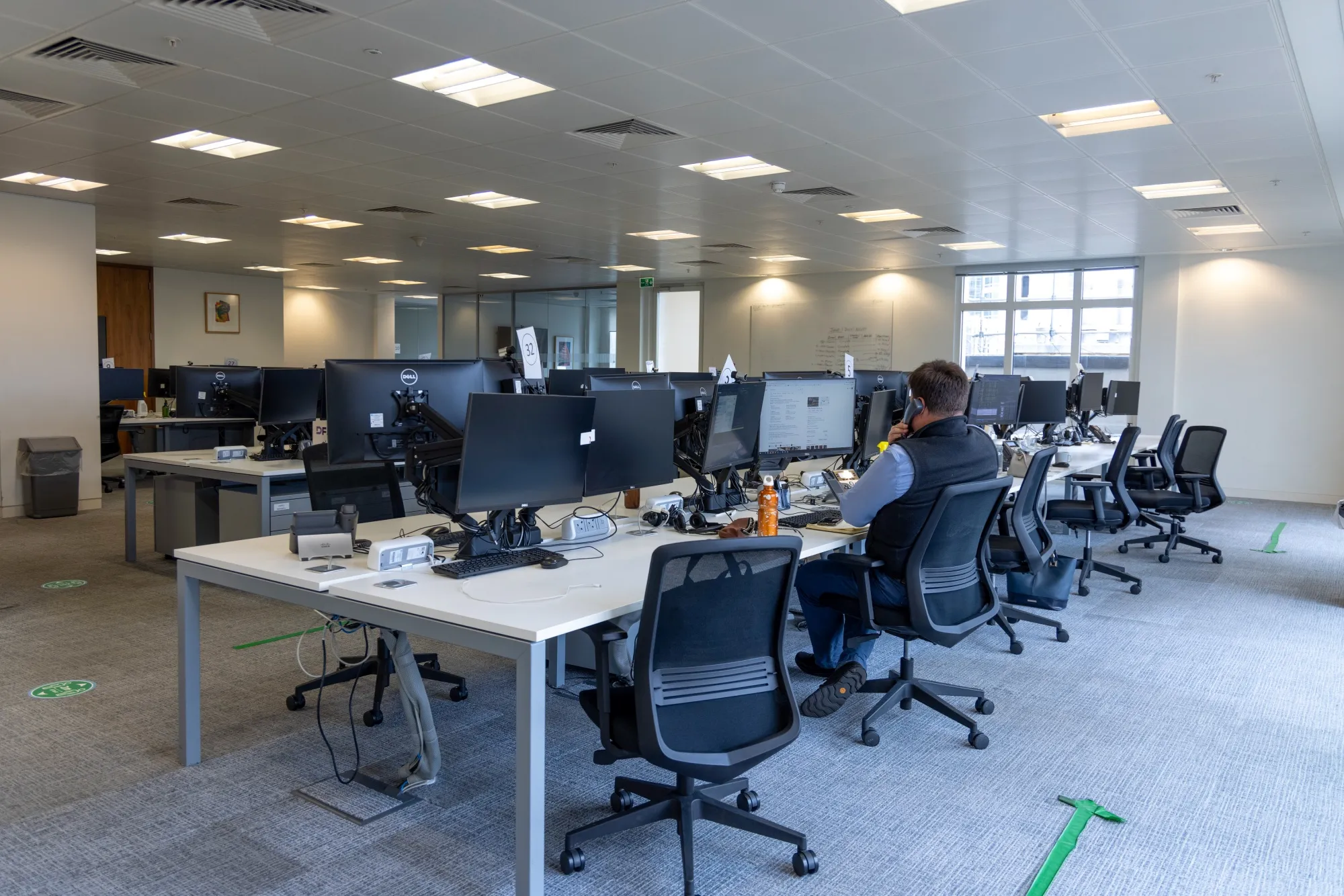 An employee works at an office in London.