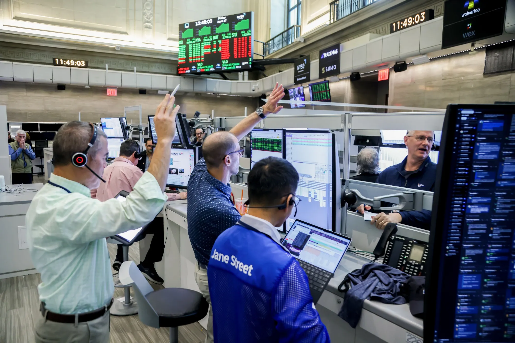 Traders work on the floor of the American Stock Exchange at the New York Stock Exchange on&nbsp;April 17.
