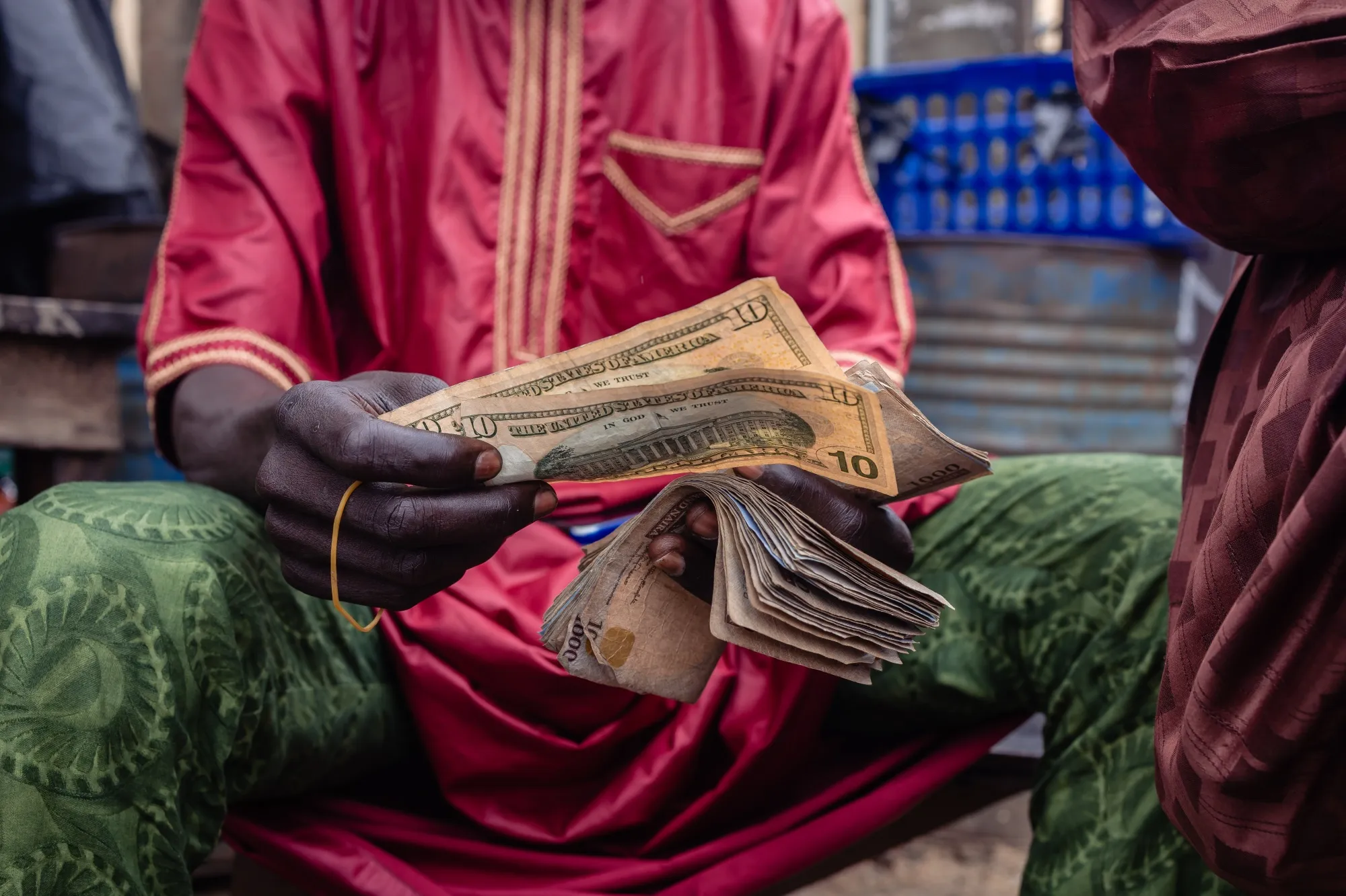 A street currency dealer&nbsp;at a market in Lagos.