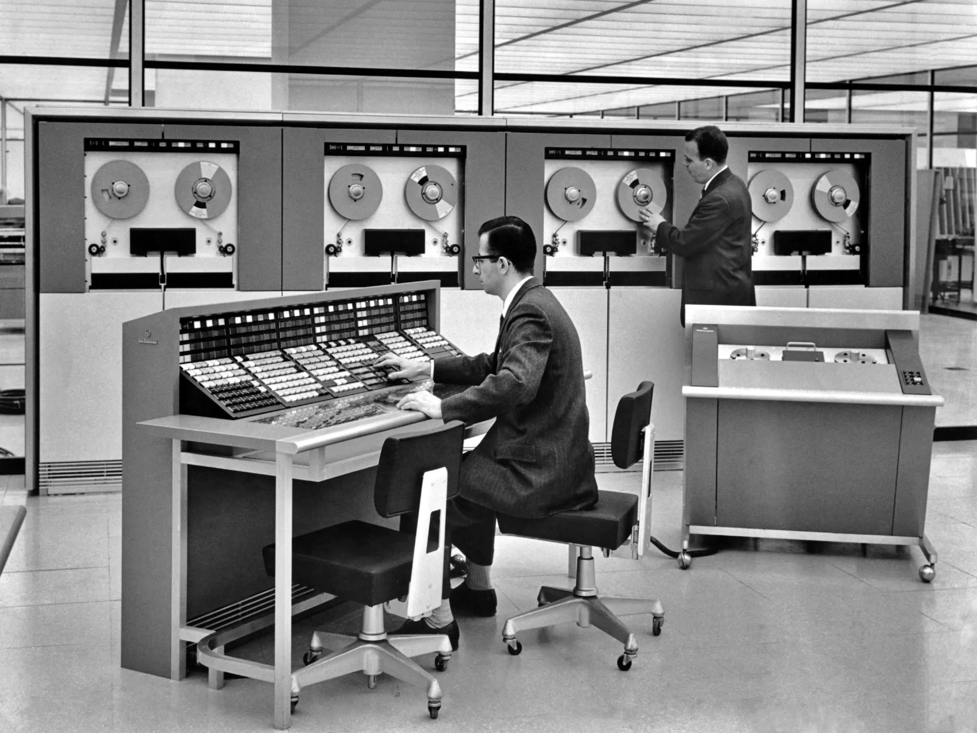 Two men operating a mainframe computer, circa 1960. (Photo by Pictorial Parade/Archive Photos/Getty Images)