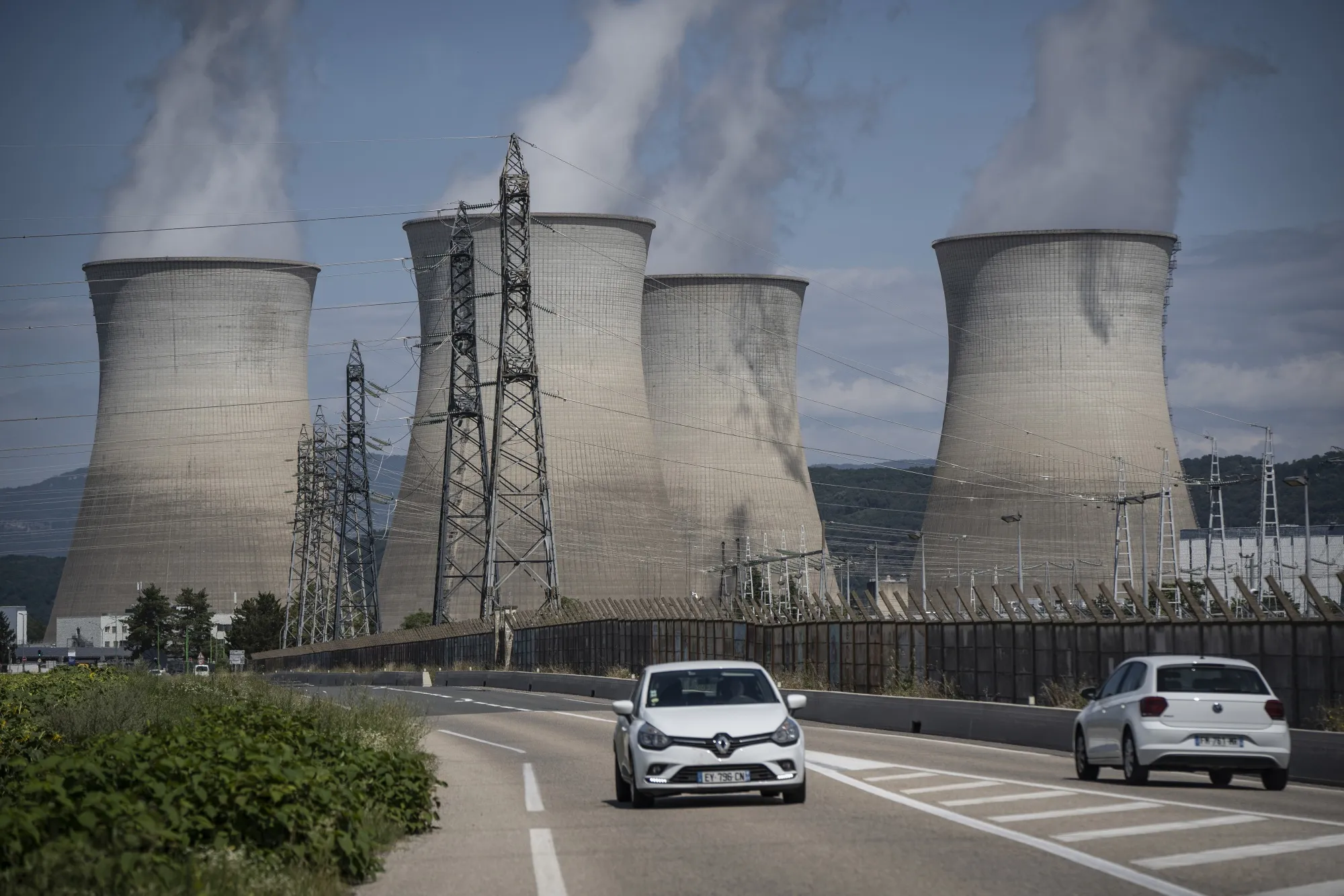The cooling towers of the Bugey nuclear power station, France.