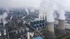 Emissions rise from smokestacks and cooling towers in China. Photographer: Qilai Shen/Bloomberg