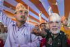 A supporter of the Bharatiya Janata Party wears a mask of Indian Prime Minister Narendra Modi during a rally in Muzaffarpur, Bihar, India.
