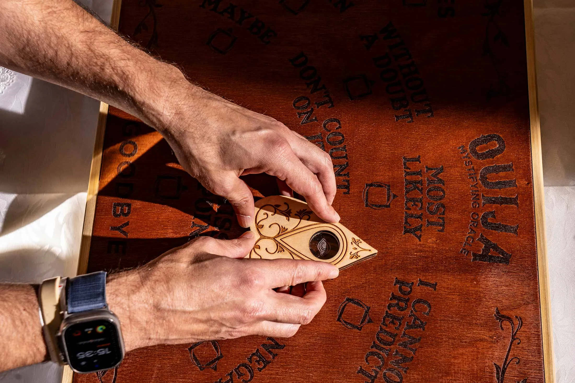 Person using a Oouji board