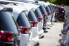 A row of Fiat Chrysler Automobiles (FCA) 2017 Crysler Pacifica minivan vehicles are displayed for sale at a car dealership in Moline, Illinois, U.S., on Saturday, July 1, 2017. Ward's Automotive Group released U.S. monthly total and domestic auto sales figures on July 3.