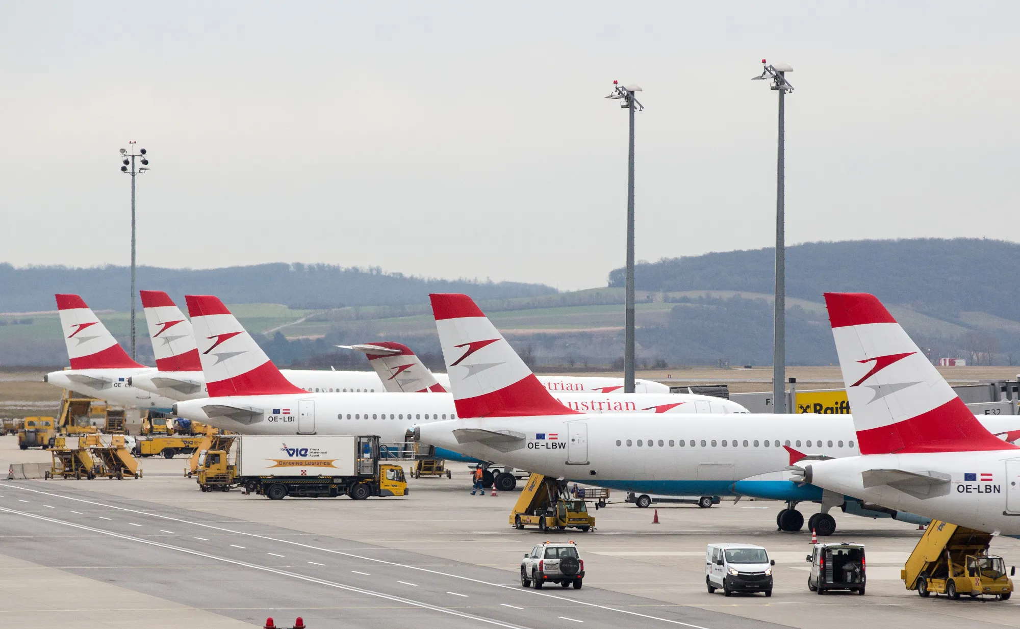 Austrian Airlines passenger jets at Vienna International Airport.