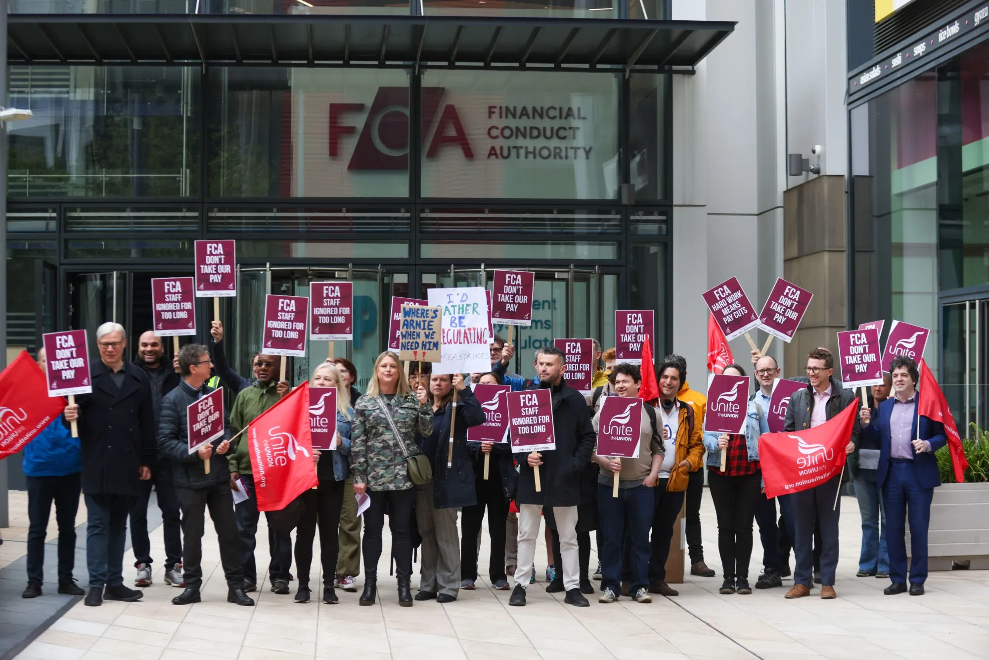 Staff at the Financial Conduct Authority strike in a dispute over pay and conditions outside their offices in London,&nbsp;on&nbsp;May 4.
