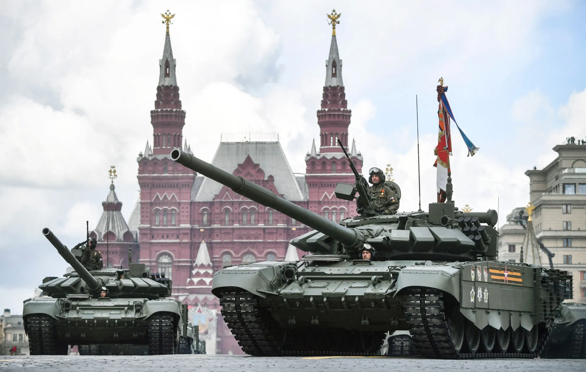 Russian tanks parade through Red Square during a Victory Day military parade.