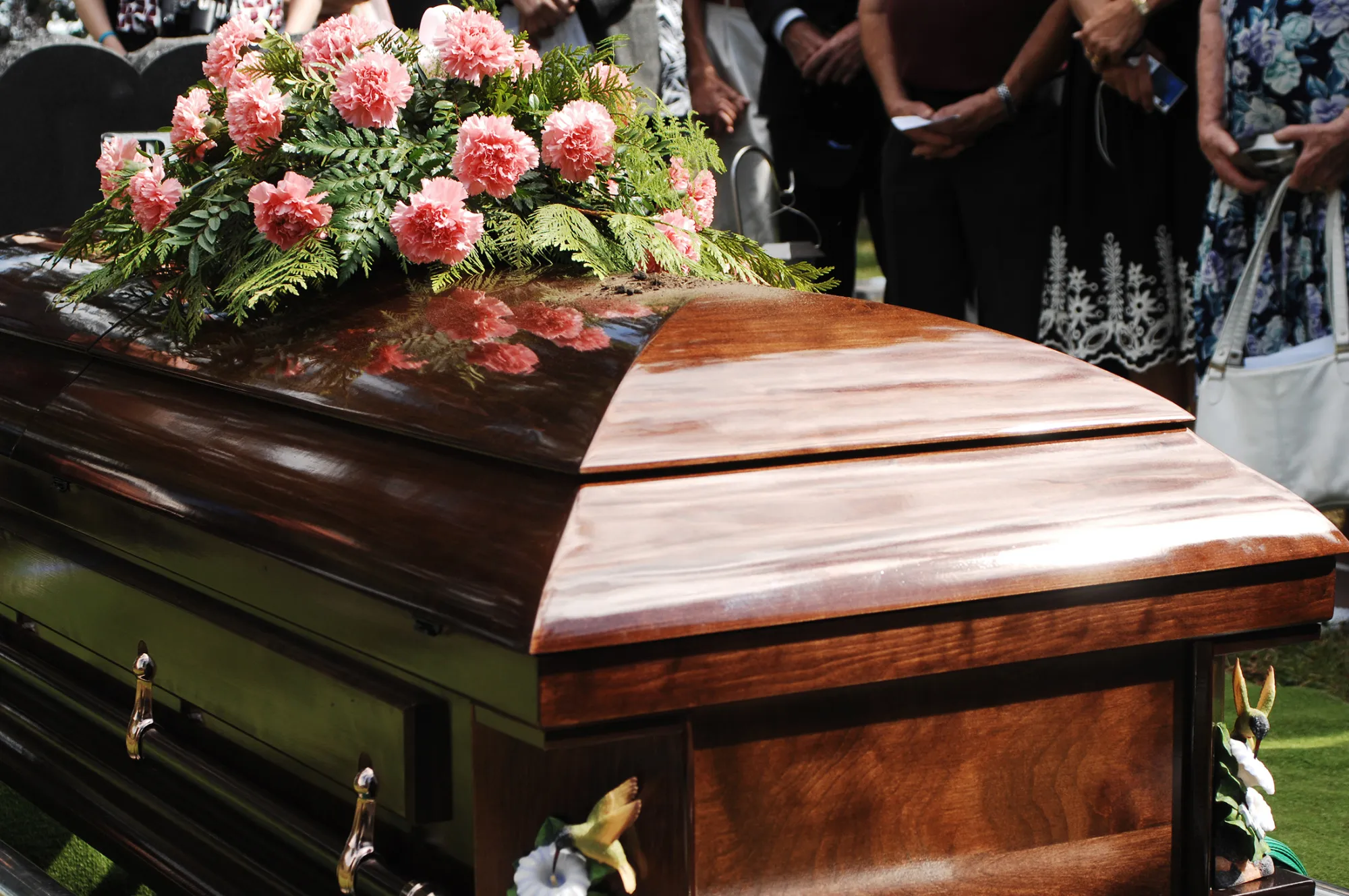 Coffin at a funeral service in a cemetery